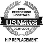 A black and white badge with laurel leaves and the text: HIGH PERFORMING HOSPITALS U.S. News & World Report 2025-2026 HIP REPLACEMENT.