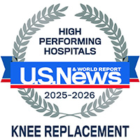 U.S. News & World Report badge reading High Performing Hospitals 2025–2026 Knee Replacement with a laurel wreath design around the text.